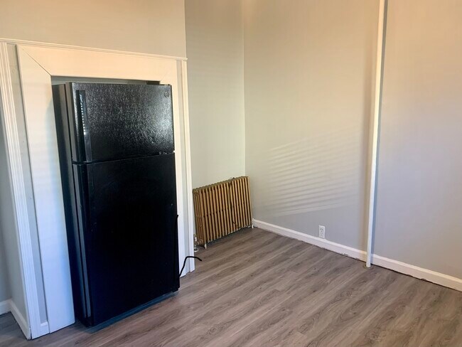 Refrigerator and eat-in area - 116 North Ave W Unidad Apt#1