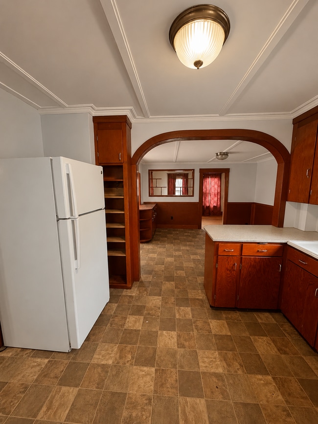 Photo - Spacious 4-Bedroom Home with Garage, Fenced Yard & Historic Character | Rochester, NH