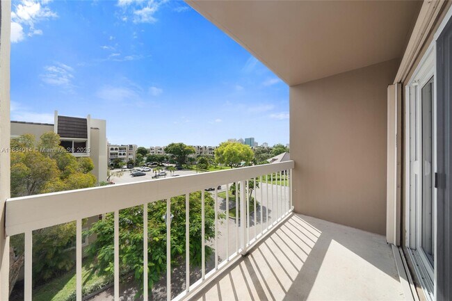 Building Photo - 7920 Camino Real Unit 404 Rental