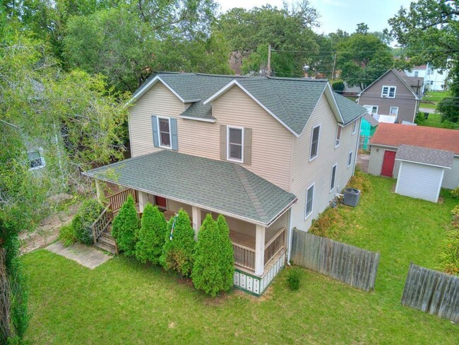 Photo - Spacious 5BR Home Near Drake — Porch, Garage & Tons of Space