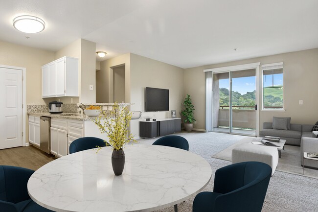 Open concept living and dining areas. - Bollinger Crest Rental