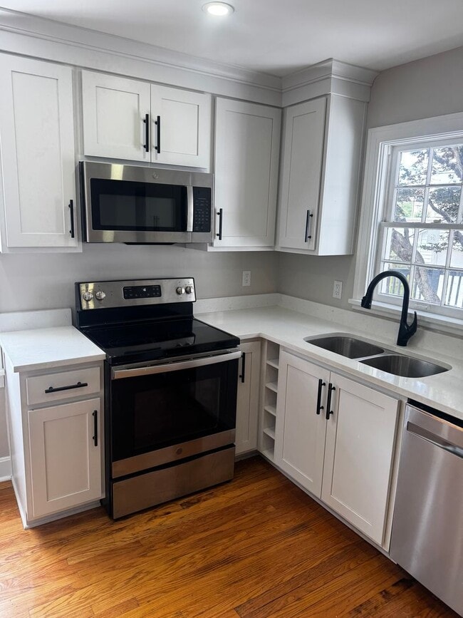 Photo - Fully Updated 3BR/2BA St. Matthews Cape Cod with Garage & Wrap-Around Deck