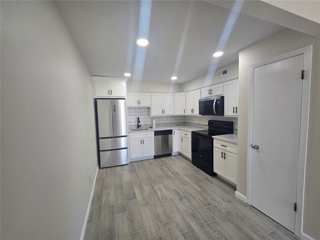 Building Photo - 4334 Arrow Tree Dr Unit H