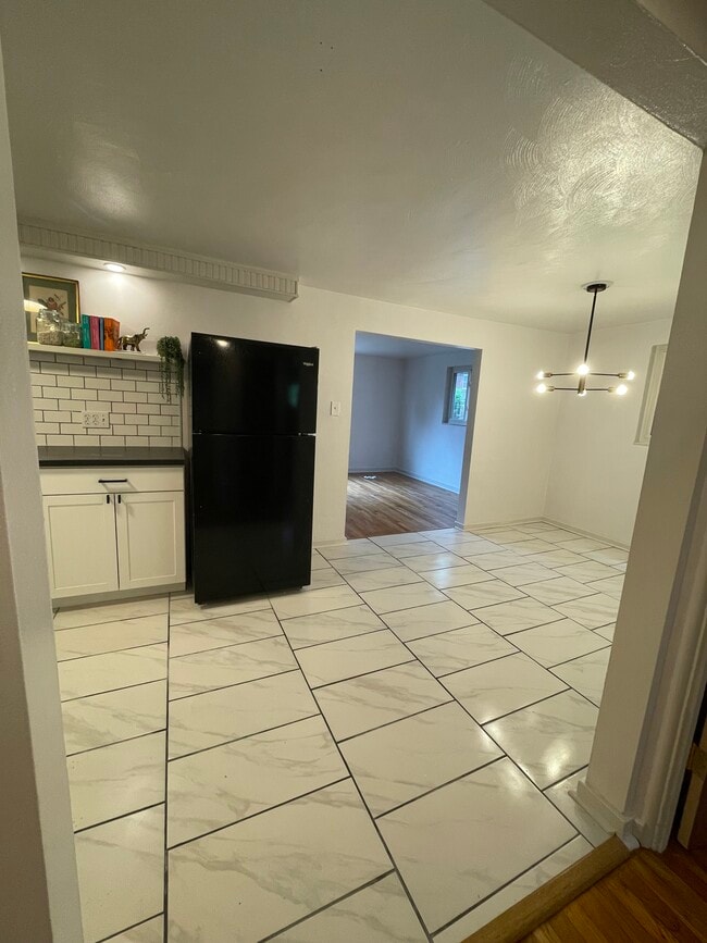 Kitchen into Living - 1116 Arkansas Ave Unit 1st Floor