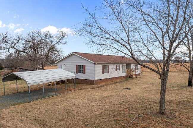 Photo - Charming 4-Bedroom Home on Spacious 2.64-Acre Lot in Graham, NC