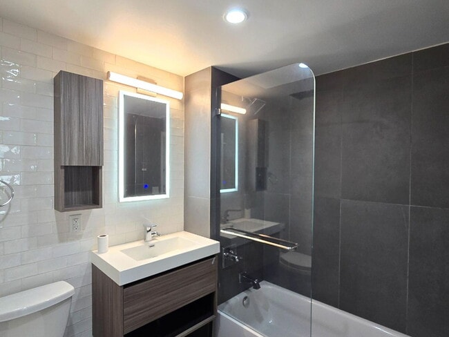 Photo - "Modern 2-Bed, 2-Bath Astoria Gem with Sleek Granite Countertops!"