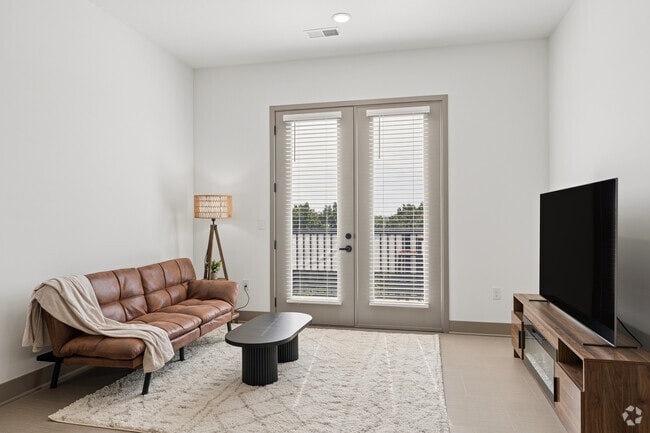 C3 - 2BR, 2BA - 1,051SF - Living Room - 120 On Oak Luxury Apartments
