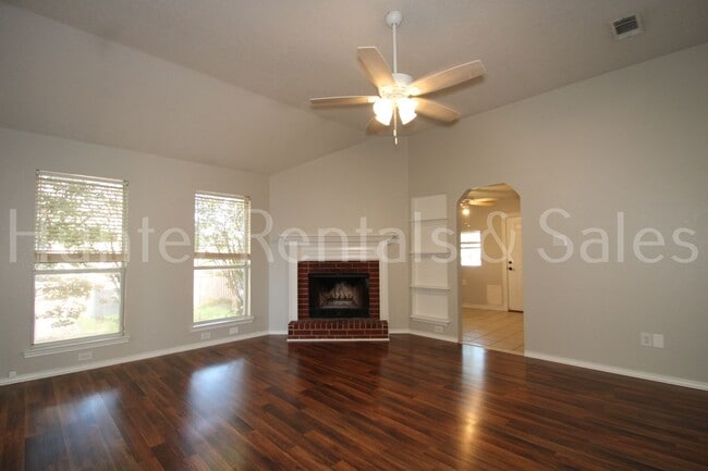 Photo - Exceptional Living with Vaulted Ceilings, Cozy Fireplace & Expansive Outdoor Space