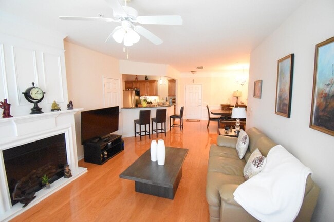 Photo - Beautiful 3BR 2BA Condo • Granite Kitchen • Balcony & Pool • Furnished 4th-Floor End Unit Condo i...