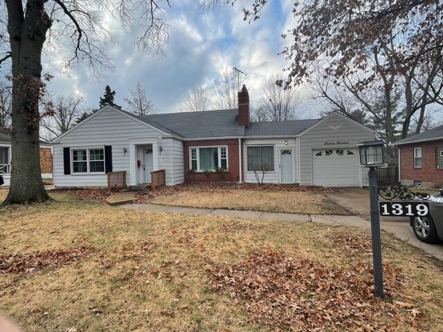 Photo - Spacious 2-Bedroom Home with Fireplace, Bonus Room, Fenced Yard & Garage