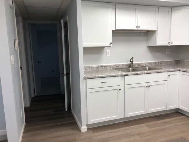 kitchen into hall - 306 E Henry St Unit Apt. 2