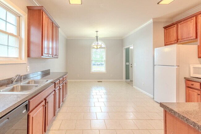 3 bed, 2.5 bath brick home across from Ted Rhodes Golf Course
