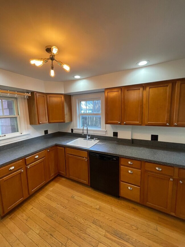 Photo - 3-Bedroom House with Theater-style Basement | Parking, Laundry, & Fenced Yard
