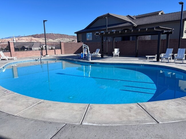 Photo - new single story 4 bed 3 bath with 3 car garage and community swimming pool