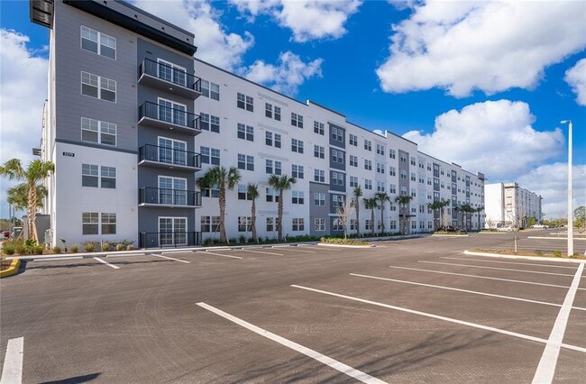 Building Photo - 5579 Millenia Park Blvd Unit 216
