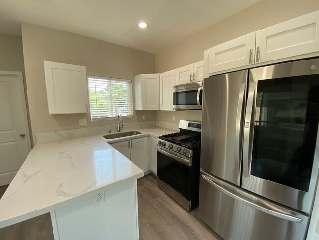 Photo - NEW (2023) 4BD/2BA!! Back gate exits right...