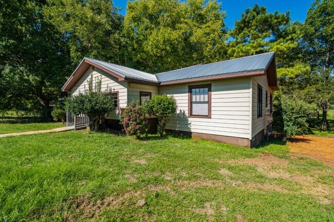 Photo - Plenty of Space Inside & Out – 4BR/2BA in ...