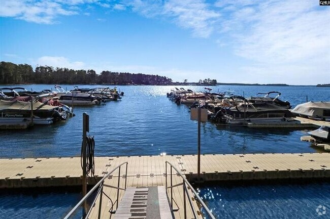 Building Photo - Deeded Boat Slip Comes with Home in Gated ...