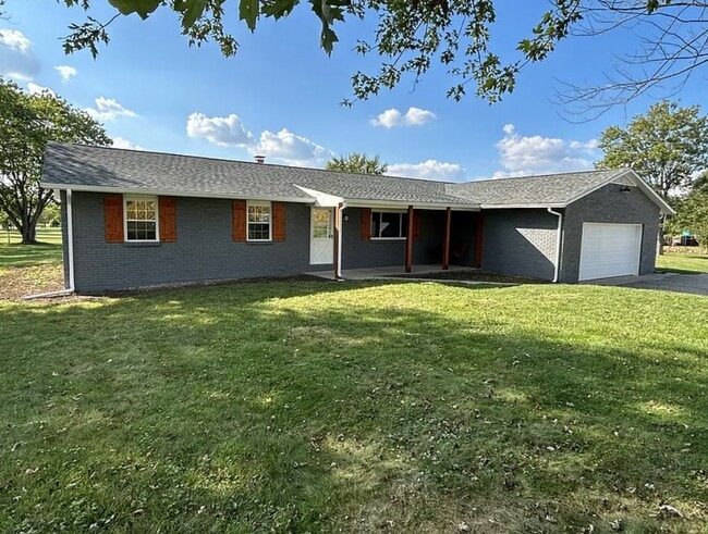 Front of house with new roof, new exterior paint and stain - 2751 Hart Rd