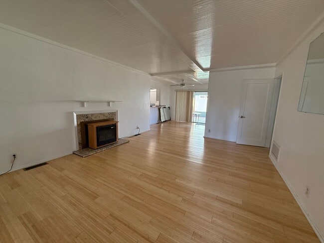 Photo - Hard floors, extra closets, patios & fence...