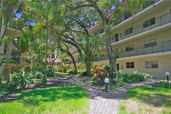 Building Photo - 3280 Spanish Moss Terrace Unit 103