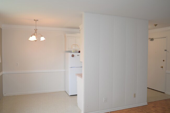 Functional layout connecting kitchen and living room for easy living at 359 Edison Apartments. - 359 Edison Avenue