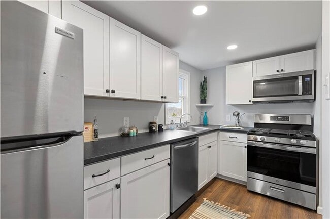 Photo - Spacious 4-Bedroom Home with Modern Updates & Private Driveway