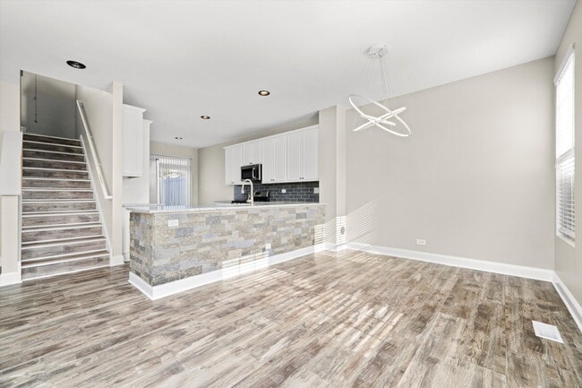 Photo - Modern 3-Bed, 2.5-Bath Townhome with Pond ...