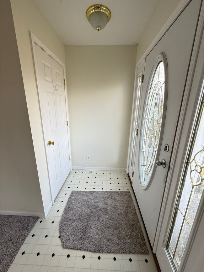 Photo - Spacious 3-Bedroom Home with Sunroom and Attached 2-Car Garage in Manchester, MI