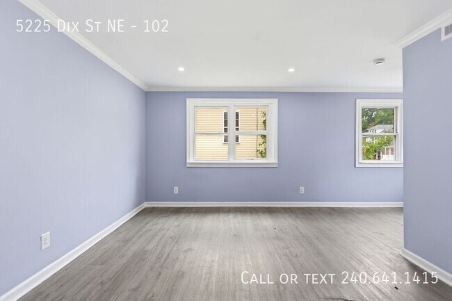 Building Photo - 5225 Dix St NE Unit 102
