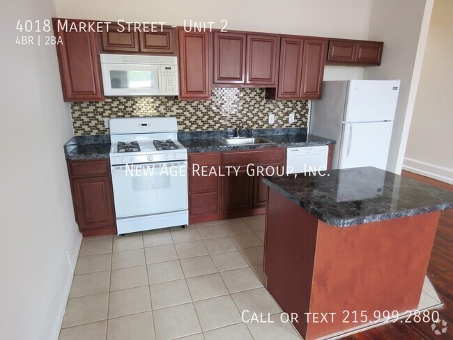 Building Photo - Spacious & modern apartment at 40th & Market! Unit 2