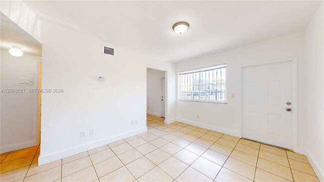 Building Photo - 1190 NW 65th St Unit 2