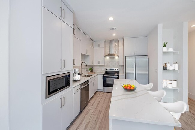 Photo - Modern Munger Place townhome with city skyline views