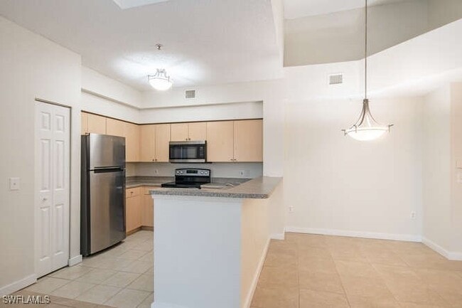 Building Photo - 1220 Reserve Way Unit 305