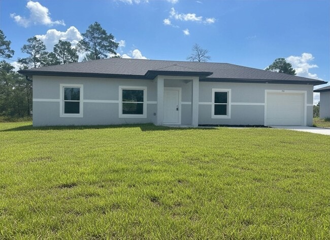 Building Photo - JUST BUILT! Modern 3 Bed / 2 Bath Home with Garage in Serene Lake Placid