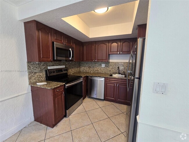 Building Photo - 5623 NW 21st St Unit 9-C Rental