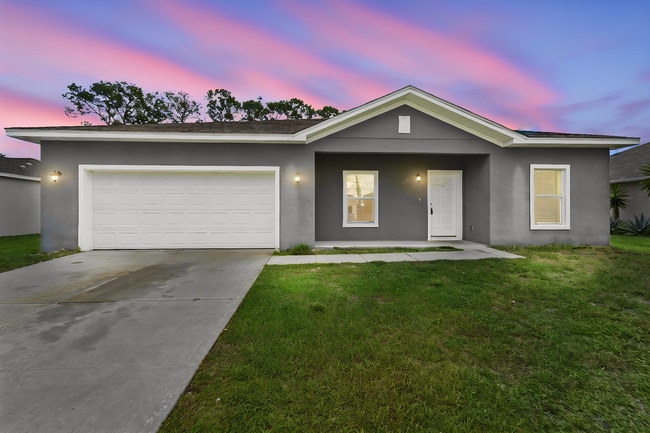 Photo - Modern New Construction 4BR/2BA Home for Rent in Palm Bay – Flexible No-Deposit Move-In Available