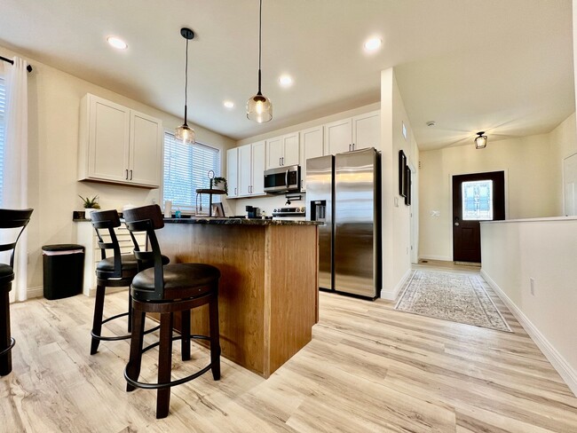 Photo - Beautiful NEW Ranch Home with a large deck...