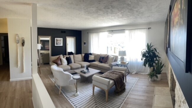 Photo - 4 Bed, 2 Bath Hillside House w/ New Floori...