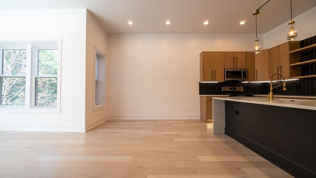 Photo - Stunning 3-Bedroom, 2-Bath Gem with In-Unit Washer/Dryer! Discover Uptown Living. Unit 4747 N Beacon 3N