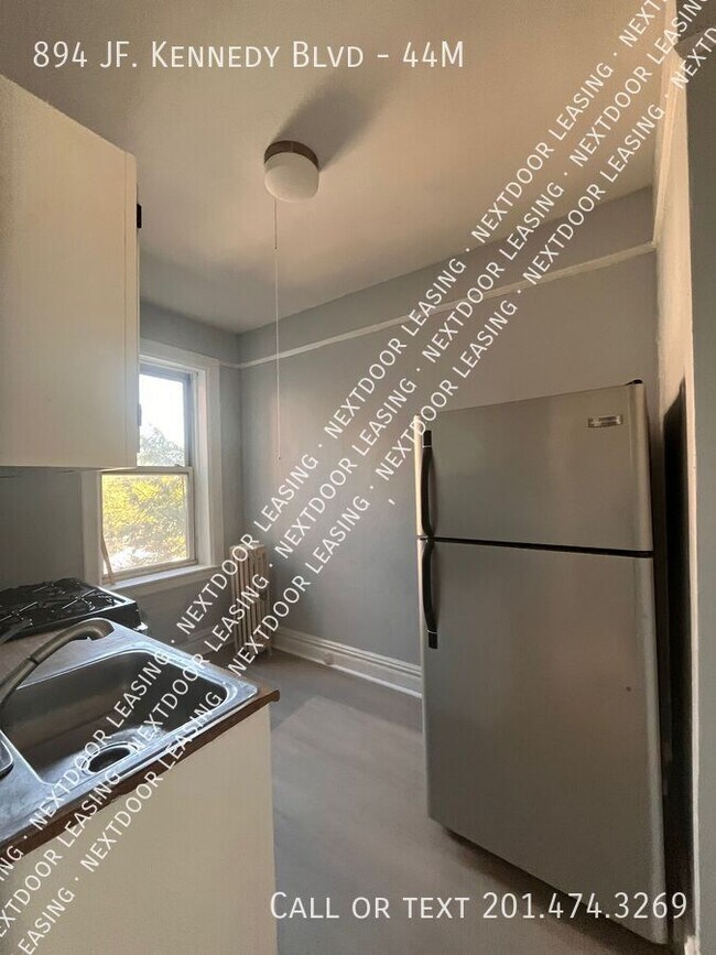 Building Photo - 894 John F. Kennedy Blvd Unit 44M