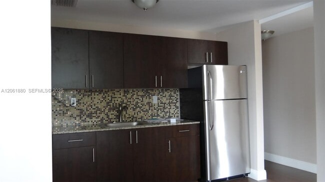 Building Photo - 1469 SW 5th St Unit 1