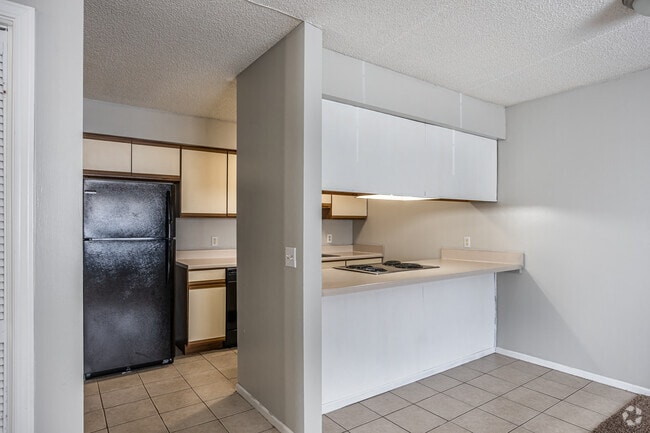 Disposición de cocina abierta - Autumn and August Place Apartments