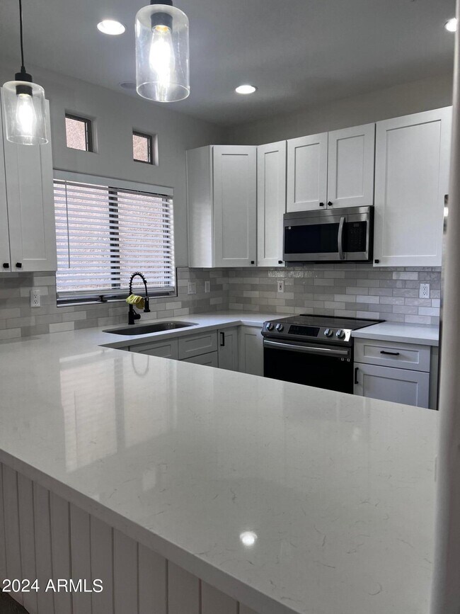 Photo - 9100 E Raintree Dr Unit 131