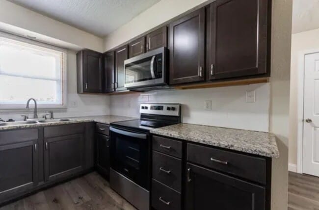 Photo - PRELEASING FOR MAY 2026!! Gorgeous 2 bedroom 2 Bath 2 Car Garage Duplex!!