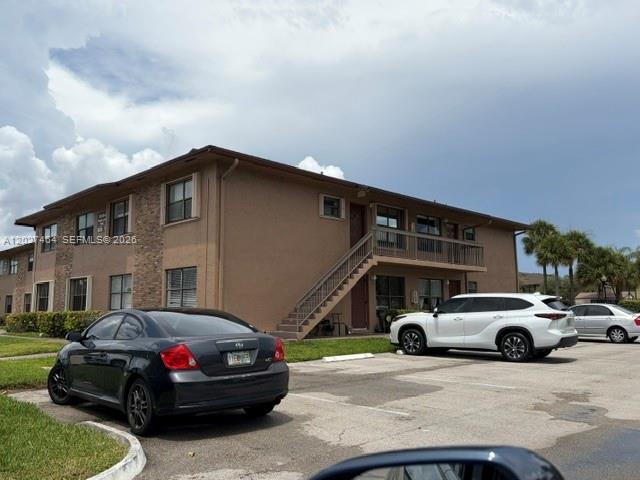 Building Photo - 10054 Winding Lake Rd Unit 201