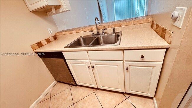 3214 NW 103rd Terrace Unit 108-B