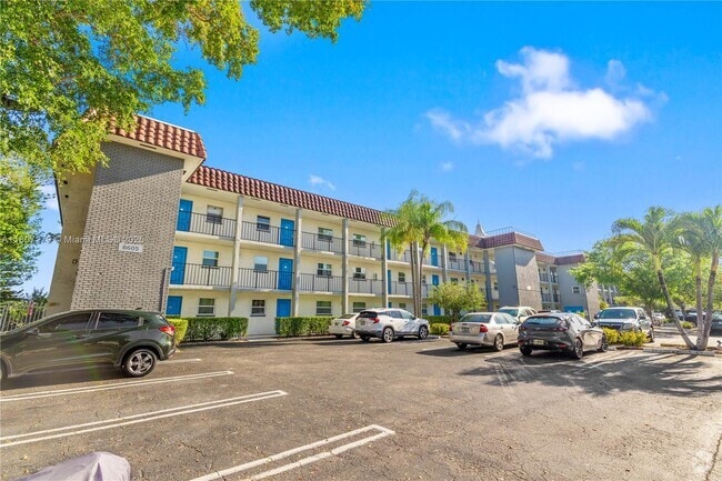 Building Photo - 8605 W Sample Rd Unit 306 Rental
