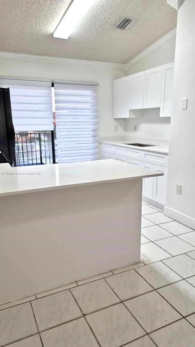 Photo - 7762 W 29th Way Unit 201