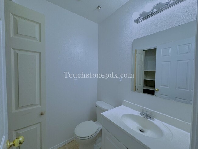 Photo - Light Filled 3 Bedroom Townhome with Deck, Attached Garage, and AC